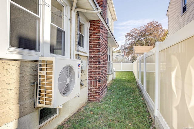 view of home's exterior with ac unit