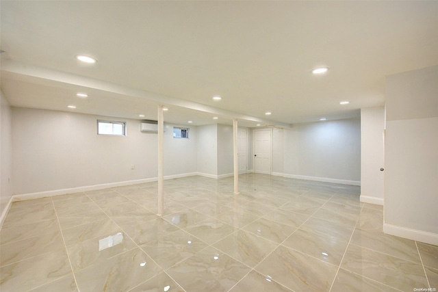 basement with a wall mounted AC