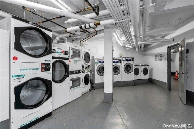 laundry area featuring stacked washer and dryer and independent washer and dryer