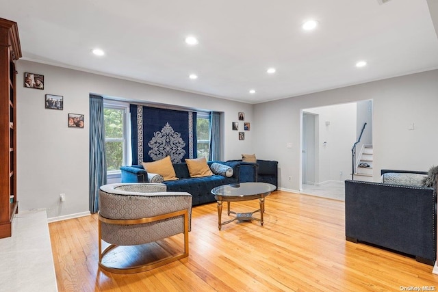 living room with light hardwood / wood-style flooring