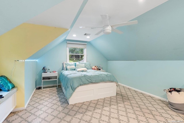 carpeted bedroom featuring ceiling fan and vaulted ceiling