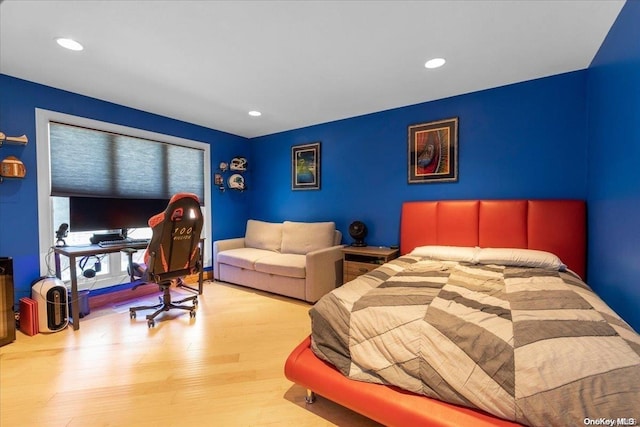 bedroom featuring light hardwood / wood-style flooring