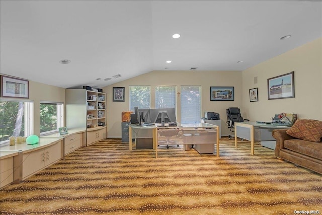 office area featuring light colored carpet and vaulted ceiling