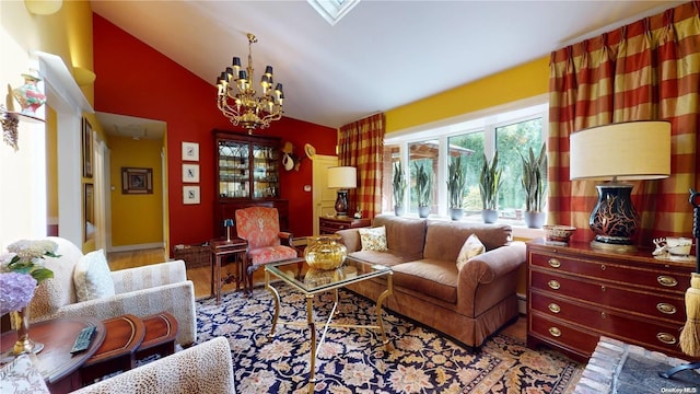 living room with a baseboard heating unit, light wood-type flooring, lofted ceiling, and an inviting chandelier