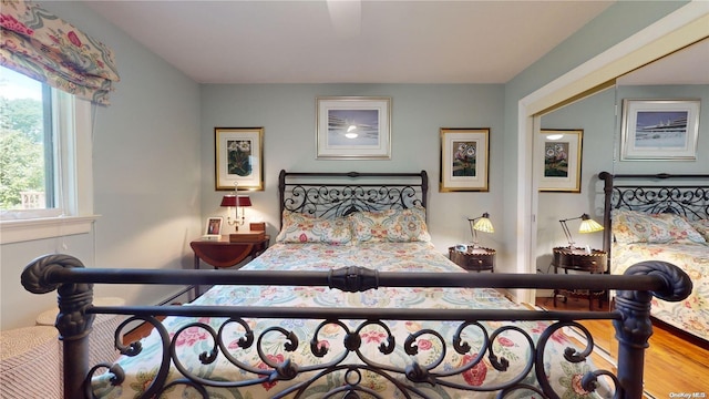 bedroom featuring hardwood / wood-style flooring