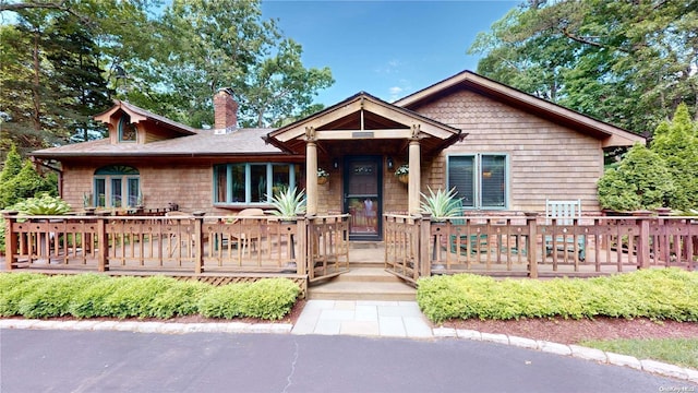 view of front of property featuring a deck