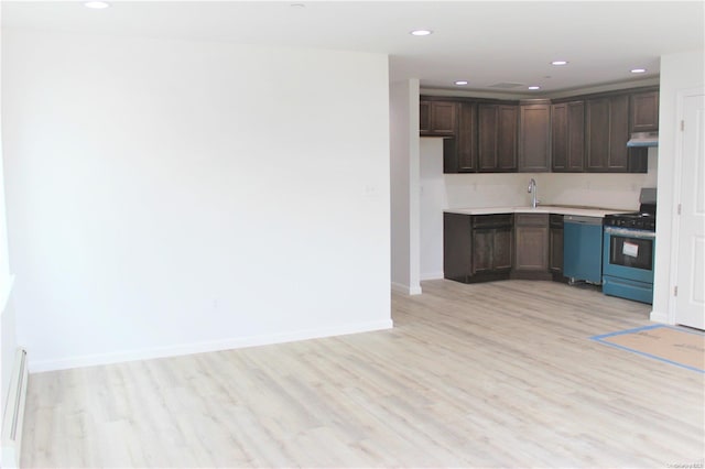 kitchen featuring dark brown cabinets, light hardwood / wood-style floors, sink, and stainless steel appliances