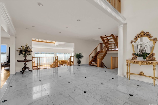 foyer entrance with ornate columns