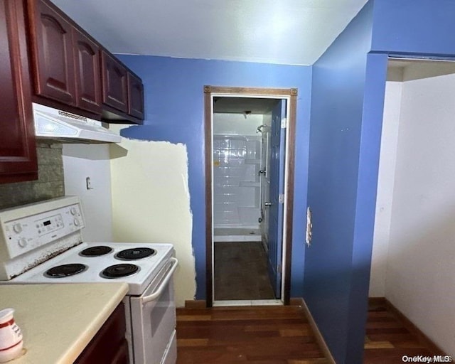 kitchen with white range with electric stovetop and dark hardwood / wood-style floors