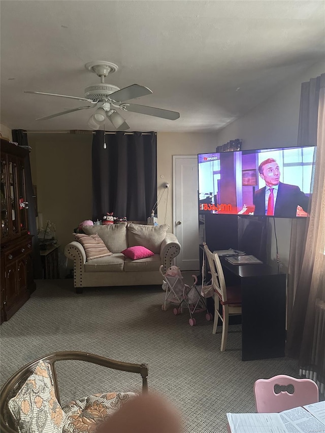 living room with carpet and ceiling fan