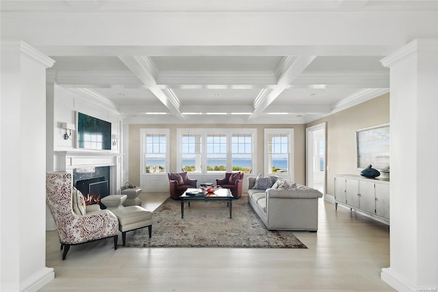 living room with beamed ceiling, light wood-type flooring, and coffered ceiling