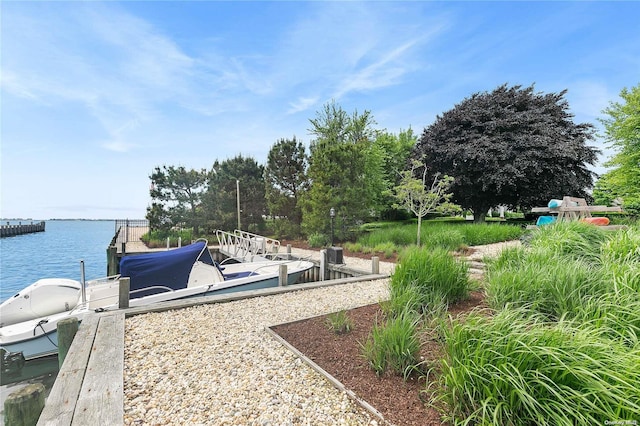 dock area featuring a water view