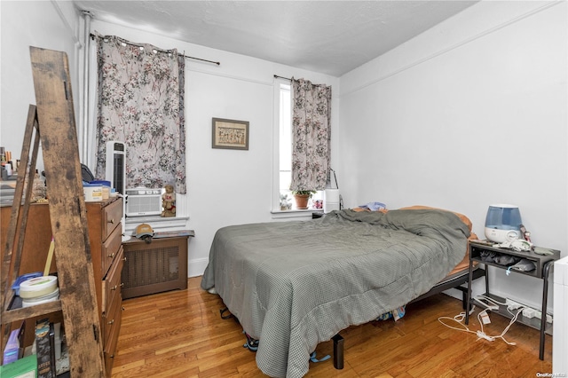 bedroom with light wood-type flooring