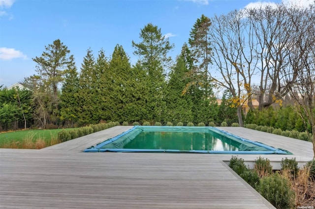 view of pool with a deck