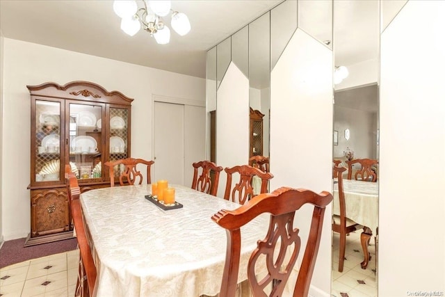 dining space featuring an inviting chandelier