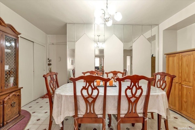 dining space featuring a notable chandelier