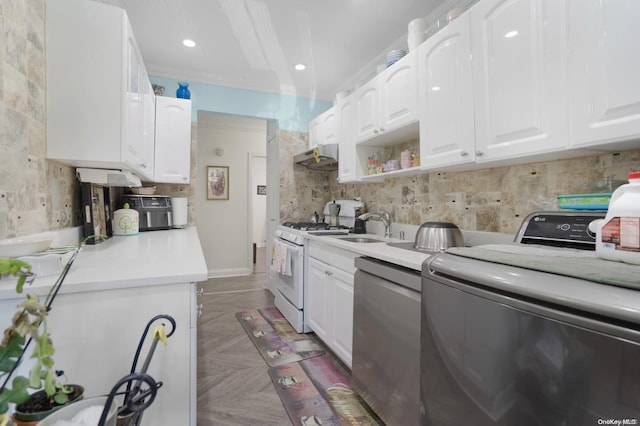 clothes washing area with washer / dryer, ornamental molding, sink, and dark parquet flooring