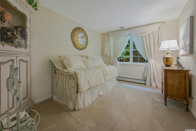 22 Saints Orchard Rd, Port Jefferson, NY 11777 - carpeted bedroom with a baseboard heating unit and baseboards
