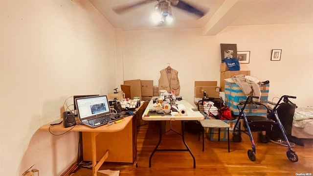 office with beam ceiling, ceiling fan, and hardwood / wood-style floors