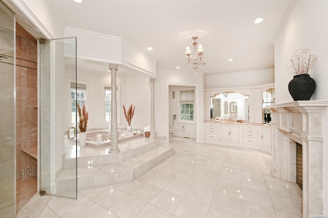 full bathroom featuring tile patterned floors, ornamental molding, plus walk in shower, and an inviting chandelier