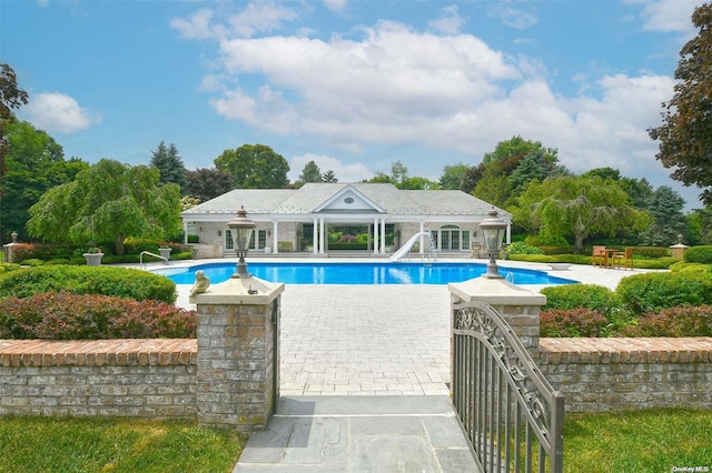 view of pool featuring a patio area