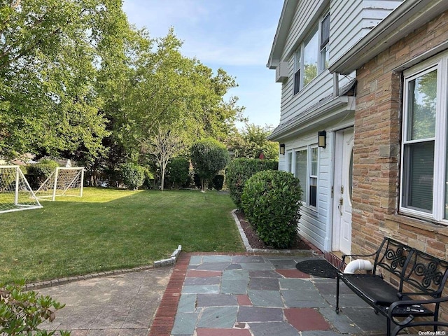 view of yard with a patio area