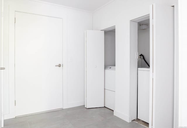 unfurnished bedroom featuring washer / dryer