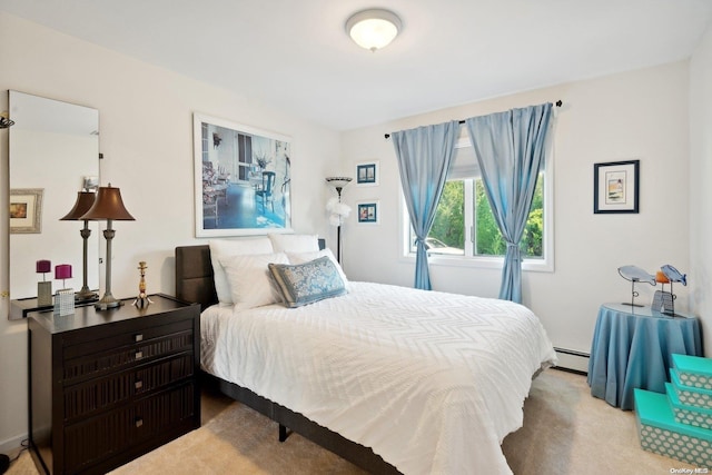 bedroom with light carpet and a baseboard radiator