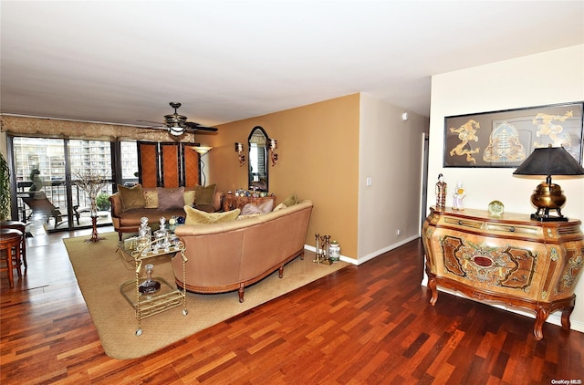 living room with ceiling fan and wood-type flooring