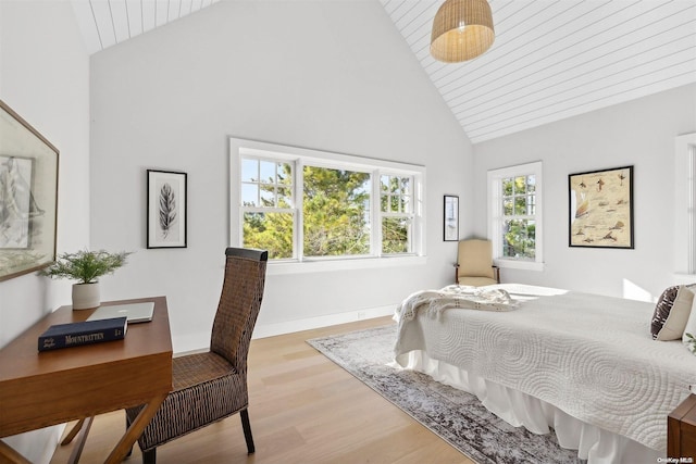 bedroom featuring high vaulted ceiling, wooden ceiling, and light wood-type flooring