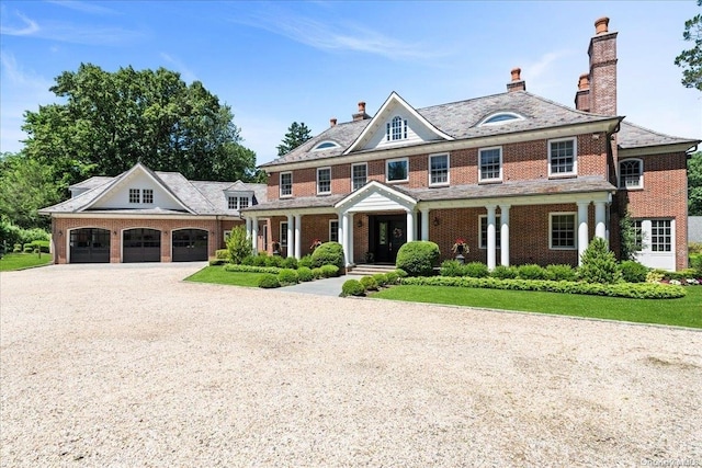 colonial-style house with covered porch