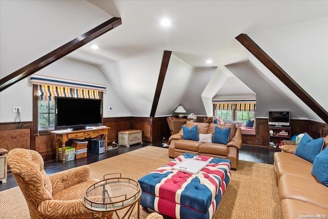 living room featuring hardwood / wood-style flooring and vaulted ceiling