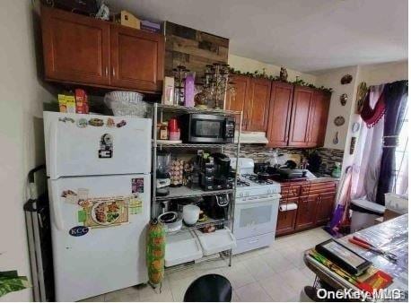 kitchen featuring white appliances