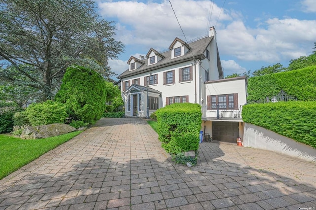 view of front of property with a garage