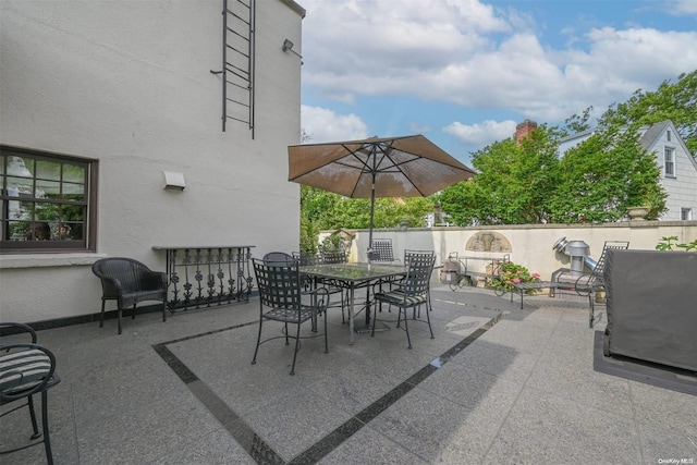 view of patio with a grill