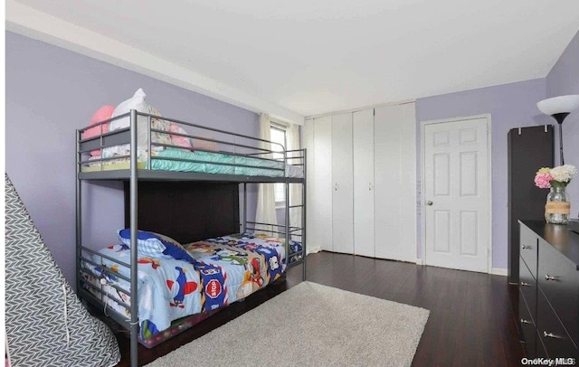 bedroom featuring dark hardwood / wood-style floors