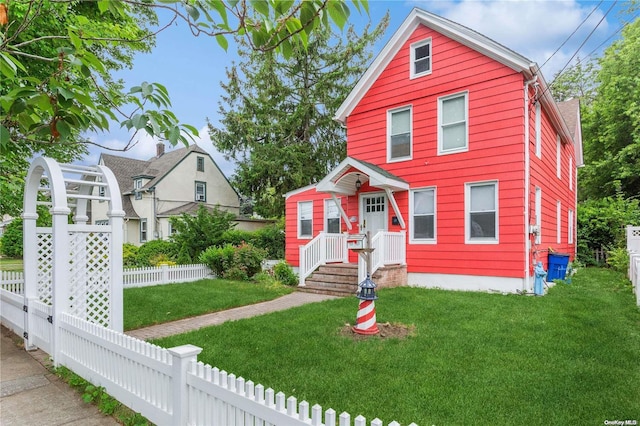 view of front of property with a front lawn