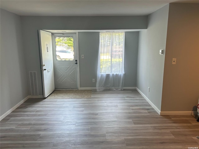 entryway with light hardwood / wood-style flooring