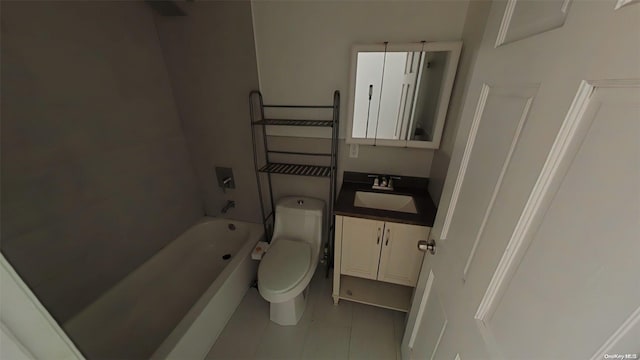 bathroom featuring tile patterned floors, vanity, and toilet