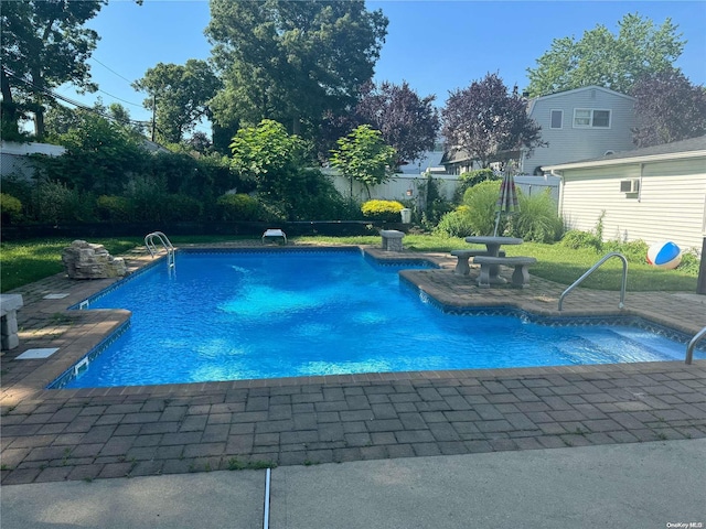 view of pool with a patio area