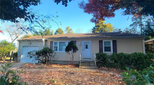 single story home with a garage