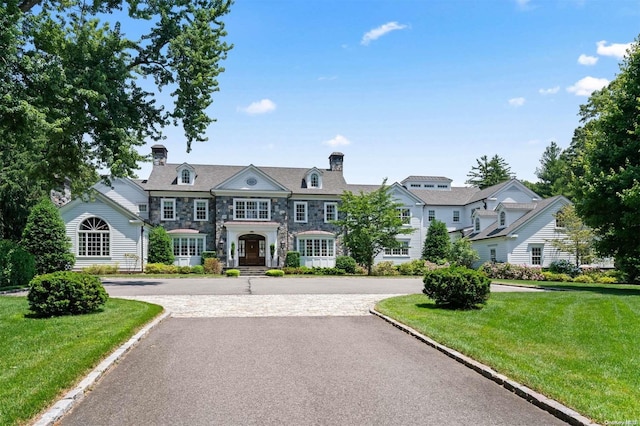 view of front of home with a front yard