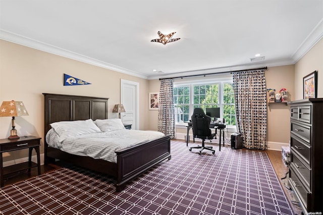 bedroom with crown molding