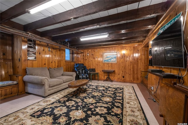 living room featuring wood walls, beam ceiling, light tile patterned flooring, and wooden ceiling