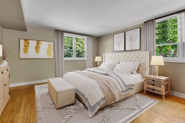 bedroom with light wood-type flooring