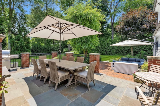 view of patio featuring area for grilling and an outdoor living space