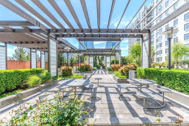 view of patio featuring a pergola