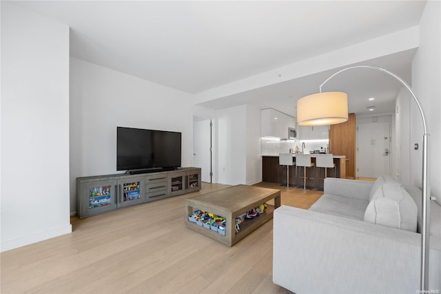 living room featuring light hardwood / wood-style floors