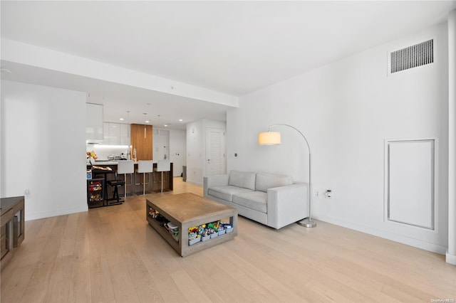 living room featuring light wood-type flooring