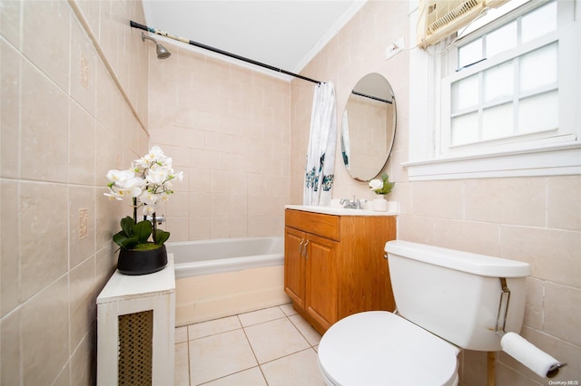 full bathroom with tile patterned floors, ornamental molding, and tile walls